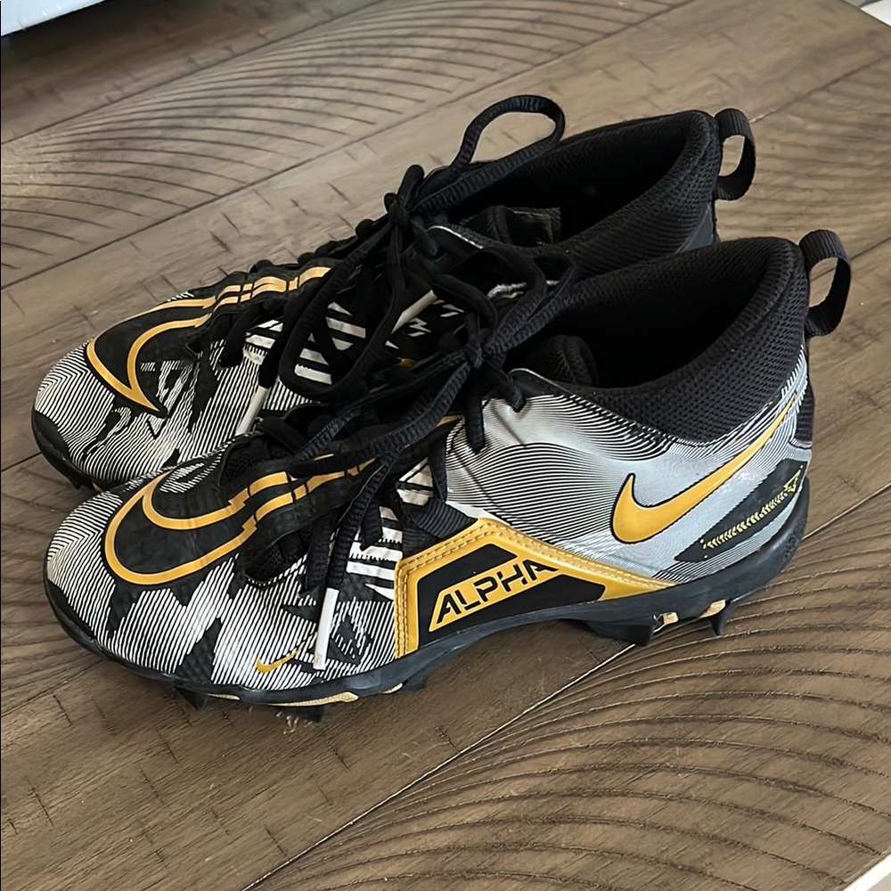 Nike Alpha Kids' Black and Gold Shoes
